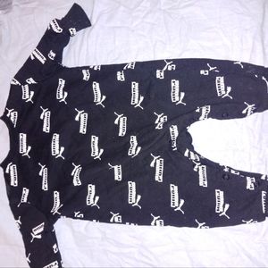 Size 0-3 month,, Puma Outfit, Black Outfit (Puma) written in white letters.